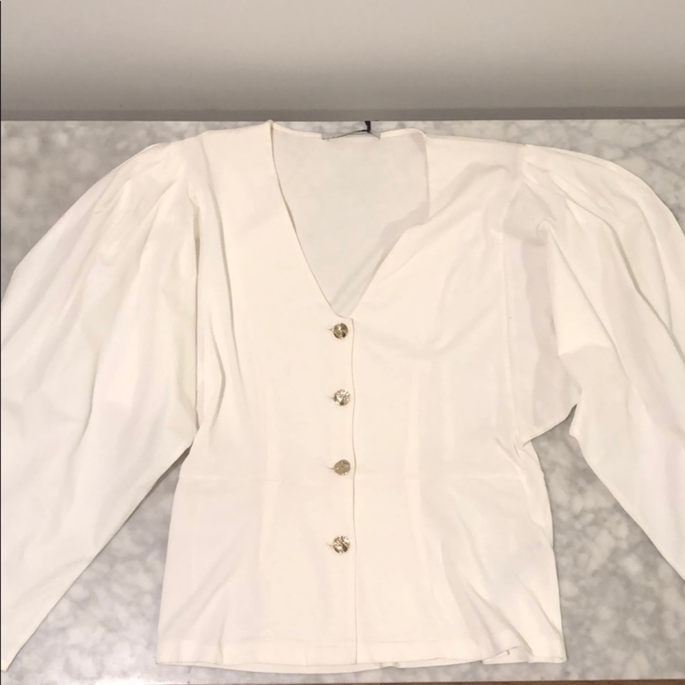 uterque white blouse with oversized sleeves